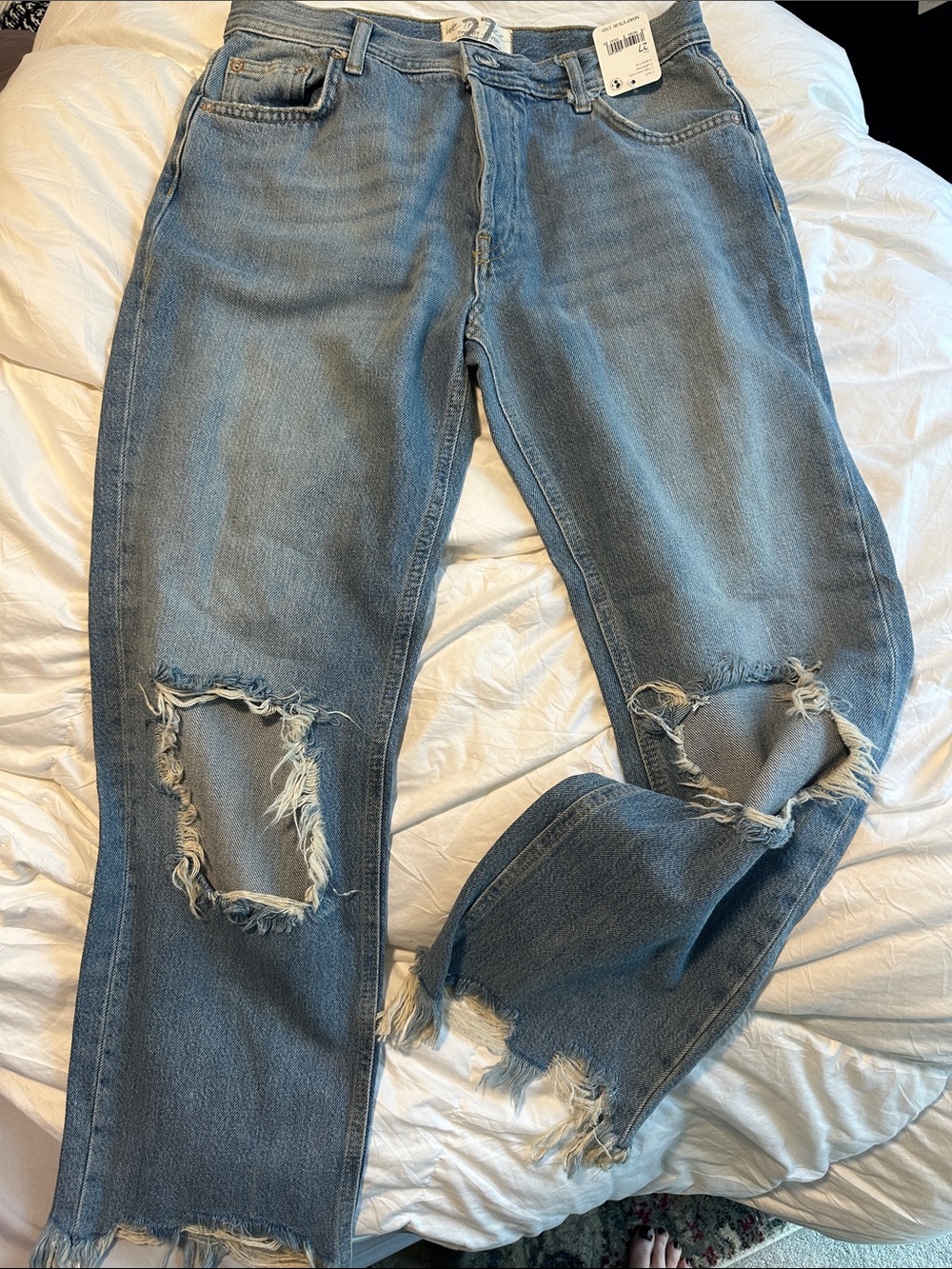 Distressed Light Blue Women's Jeans - Casual Ripped Denim. We the Free